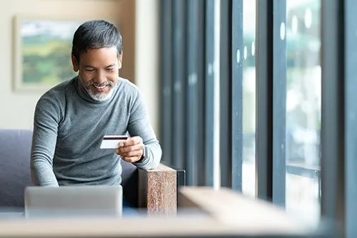 man checking financial information