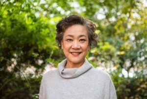 Smiling woman in a forest